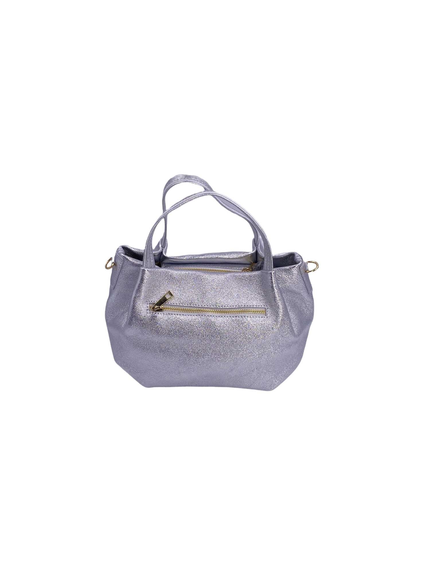 Cristine - L'eleganza prende forma in vera pelle.