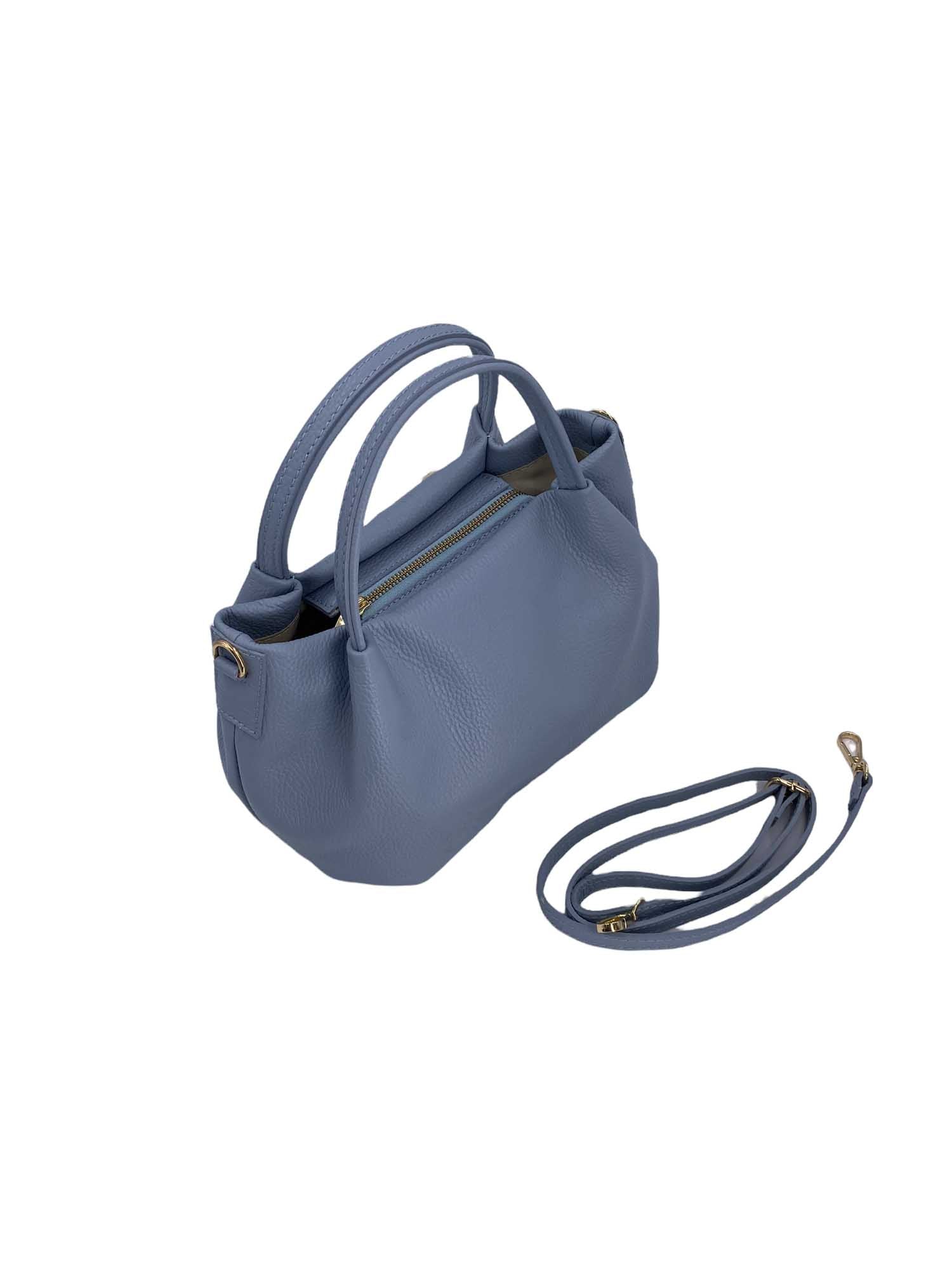 Cristine - L'eleganza prende forma in vera pelle.